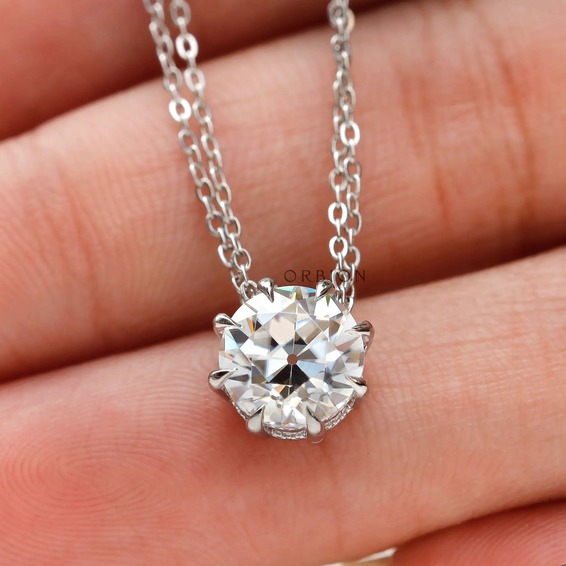Antique style round pendant on chain minimal design