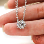 Close view of prong setting old european cut moissanite