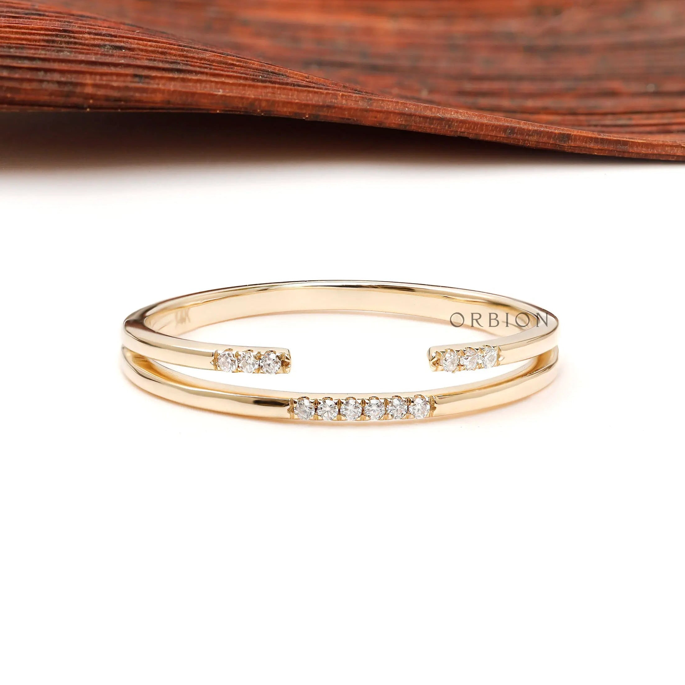 Front view of pave open cuff thin minimalist stacking band in yellow gold
