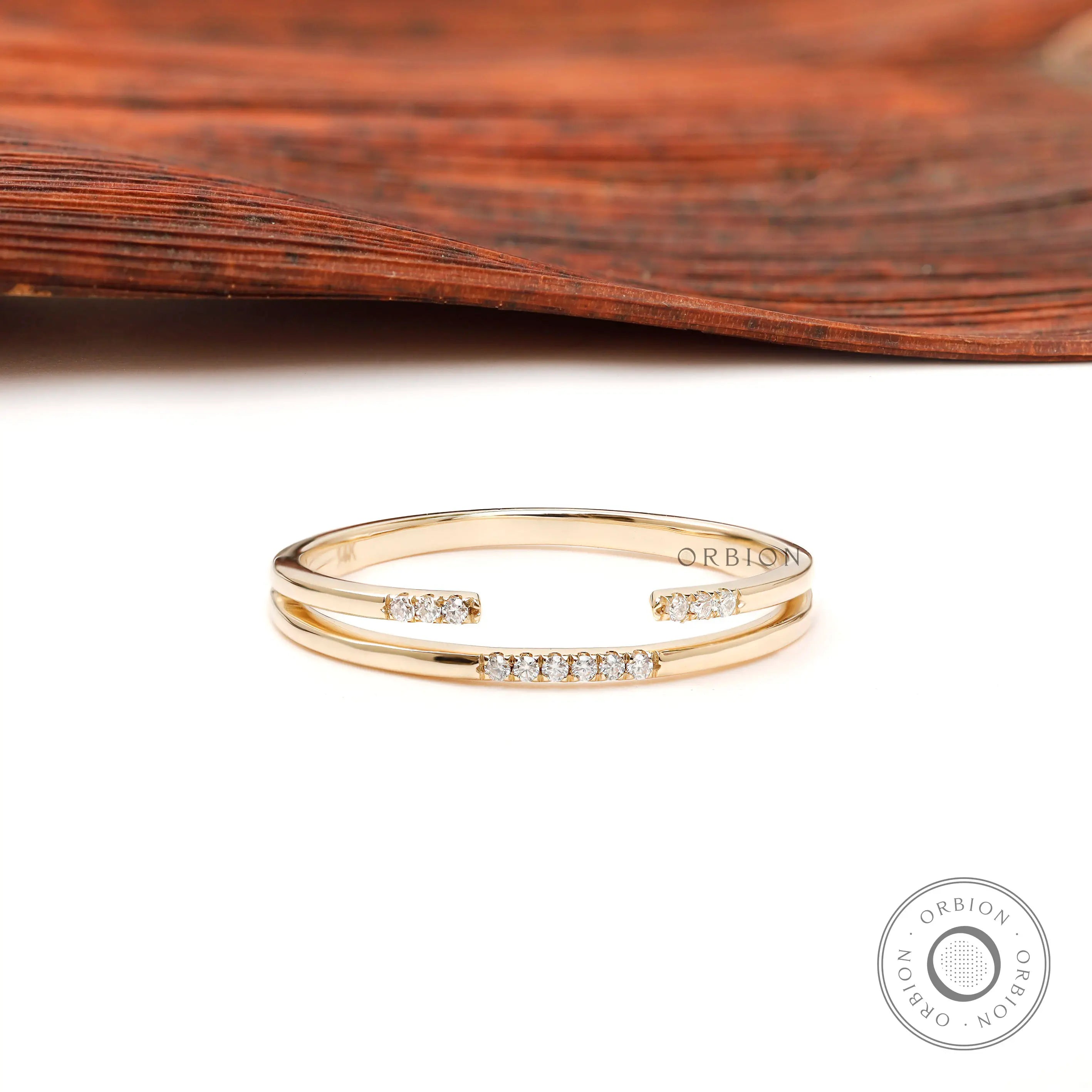 Front view of pave open cuff thin minimalist stacking band in yellow gold