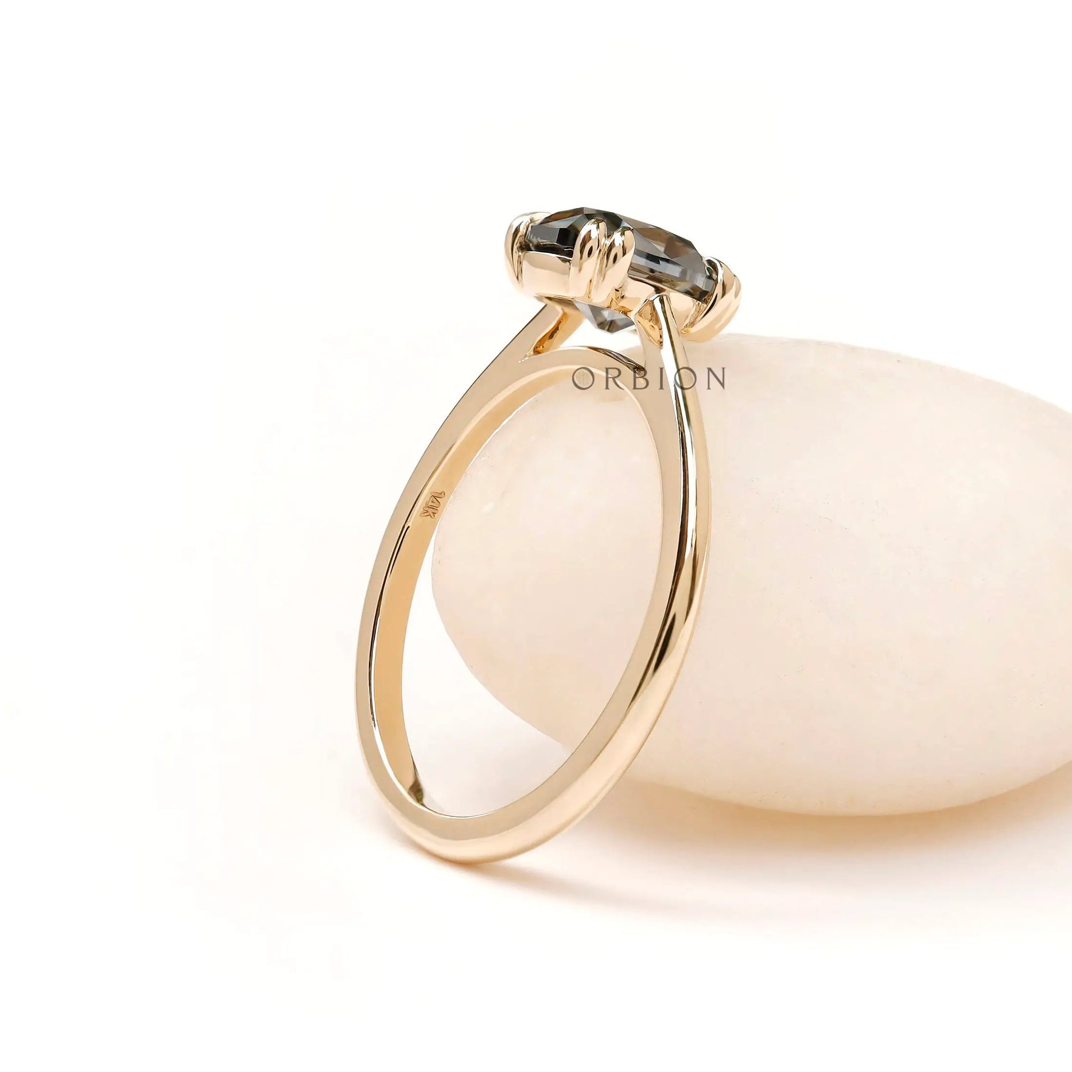 Classic solitaire moissanite ring with slim yellow gold band