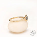 Side profile of elongated cushion grey moissanite solitaire ring
