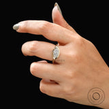 East west marquise lab diamond bezel engagement ring on hand