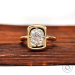Cushion cut moissanite chunky ring in yellow gold front view