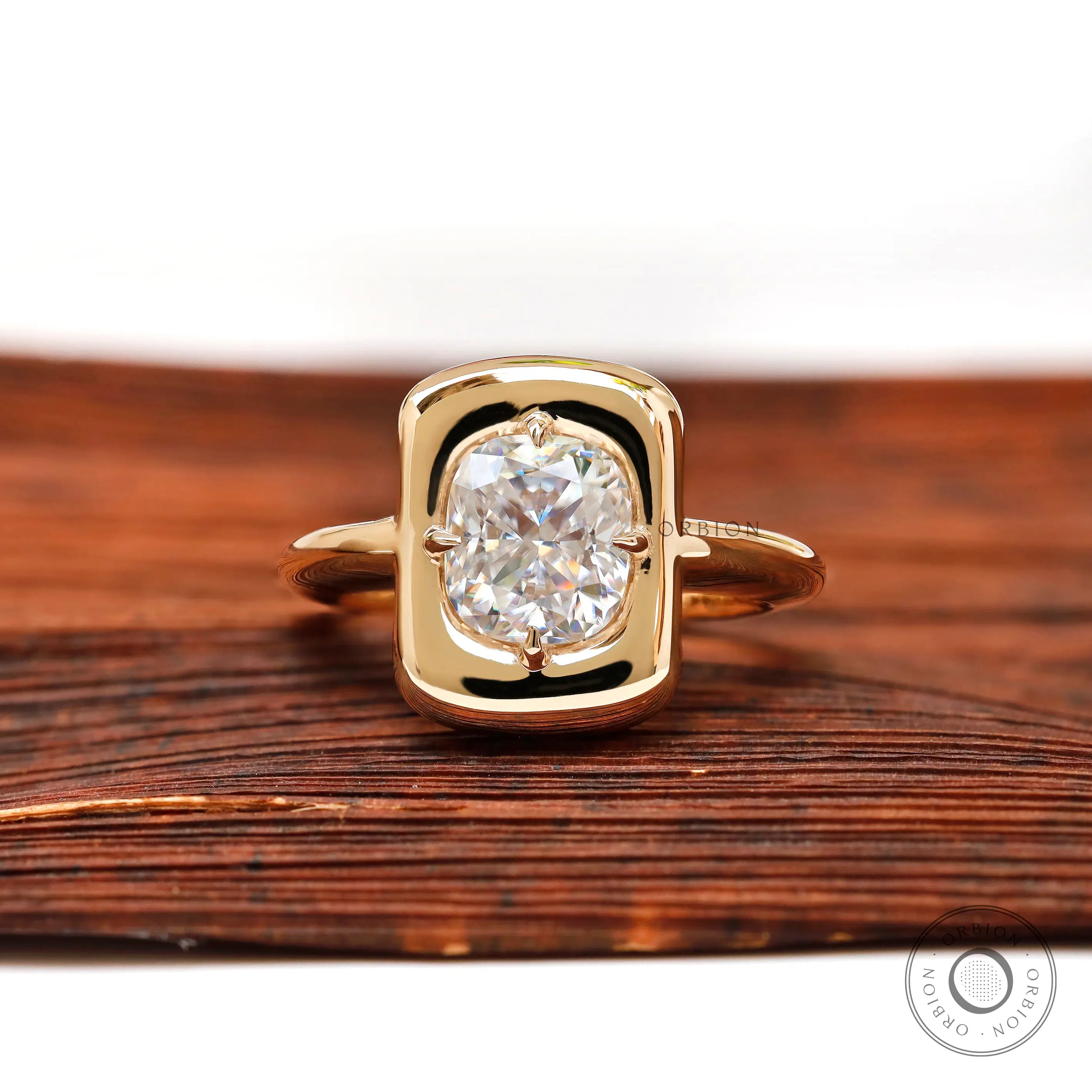 Cushion cut moissanite chunky ring in yellow gold front view