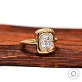 Cushion moissanite solitaire ring angled bezel setting with a chunky style