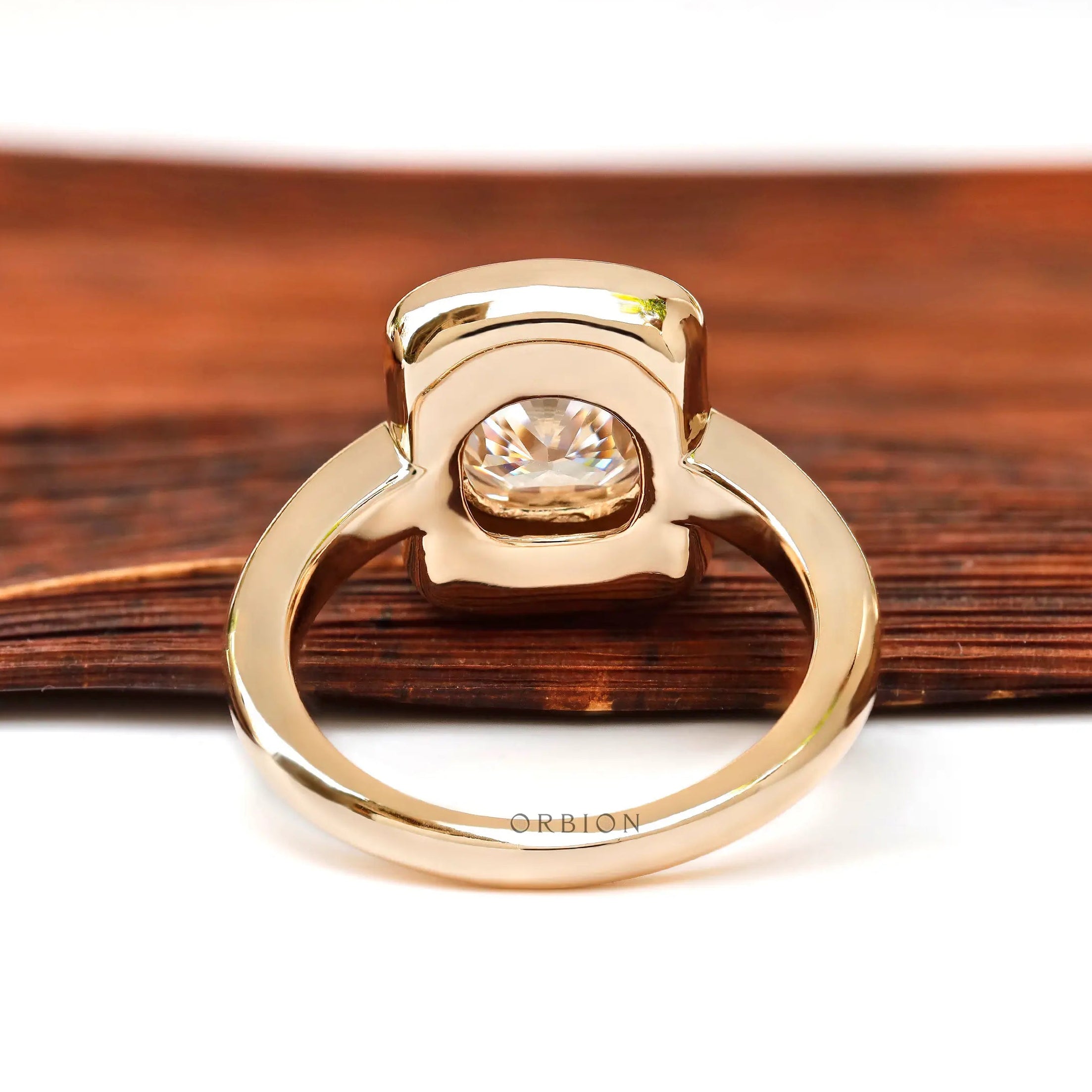 Rear view of chunky style cushion moissanite ring