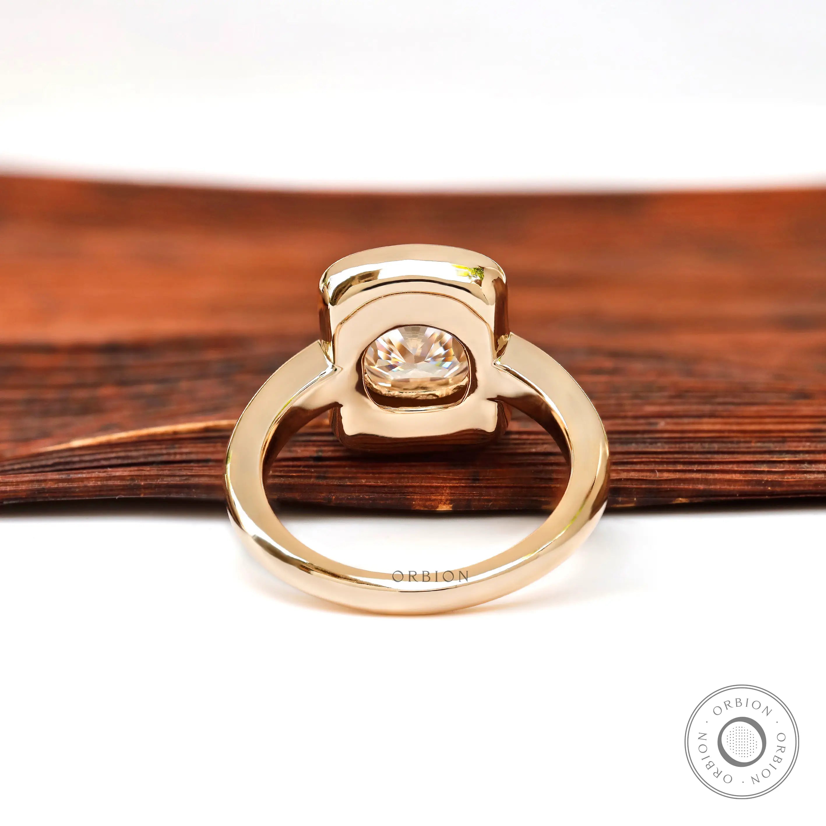 Rear view of chunky style cushion moissanite ring