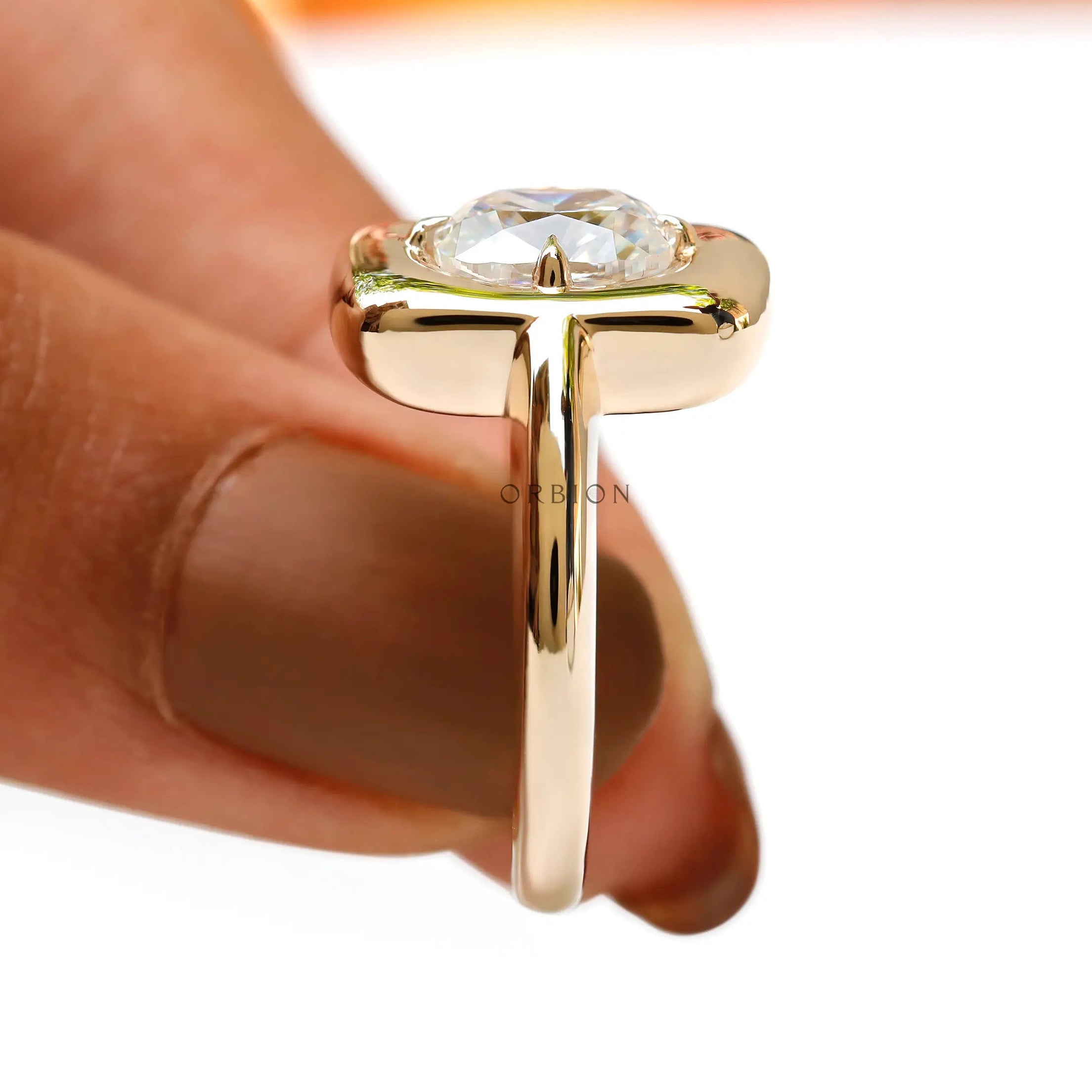 Solitaire chunky cushion moissanite ring on hand 