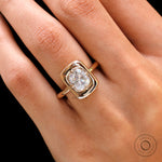 Cushion cut moissanite bezel ring worn on hand