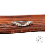 Front view of curved bubble prong half eternity diamond wedding band in matte white gold