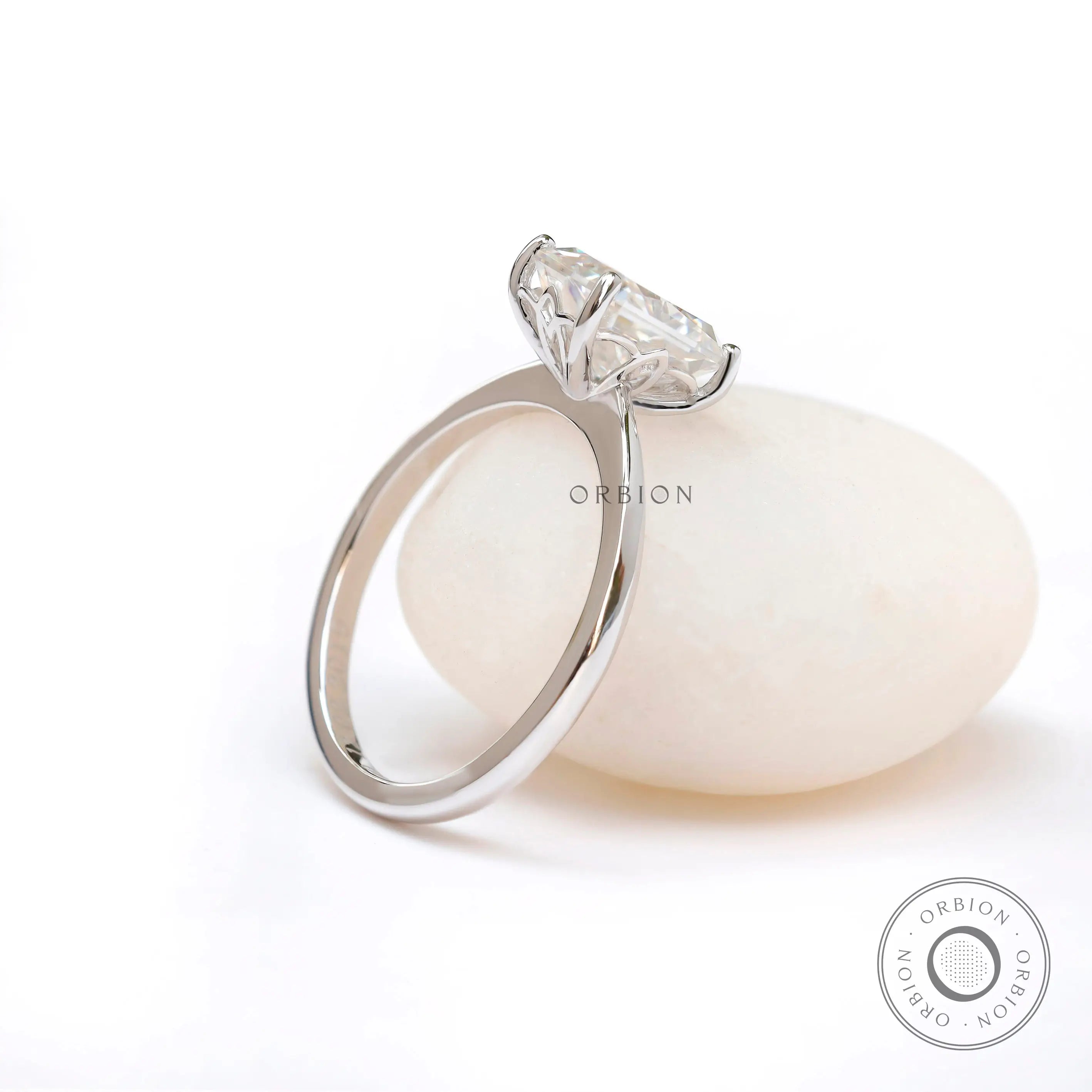 Side angle view of radiant cut solitaire engagement ring