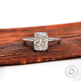 Radiant cut solitaire engagement ring in 10K white gold front view