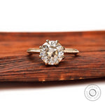 Round Old European cut moissanite solitaire ring in yellow gold