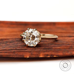 Front view of round old European cut moissanite engagement ring