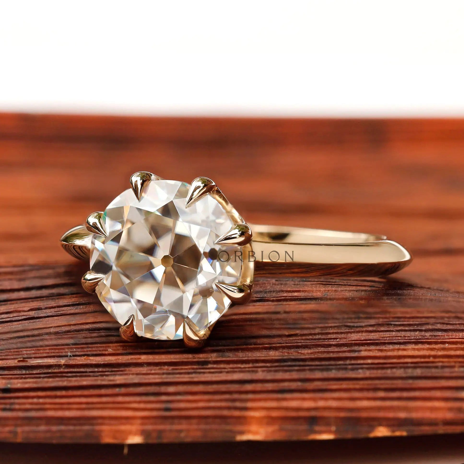 Front view of round old European cut moissanite engagement ring