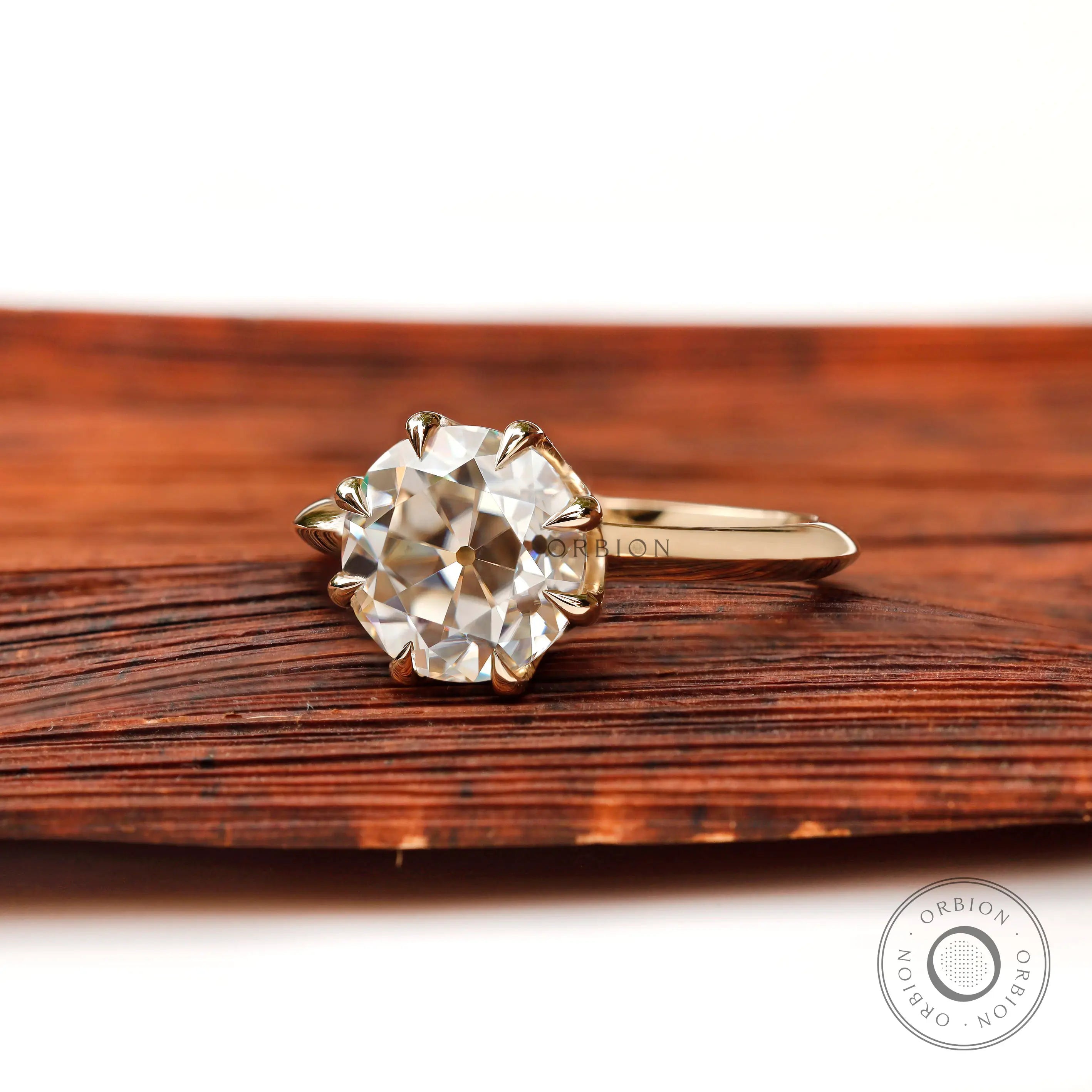 Front view of round old European cut moissanite engagement ring