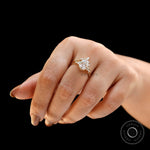 Floral-inspired moissanite cluster ring in yellow gold