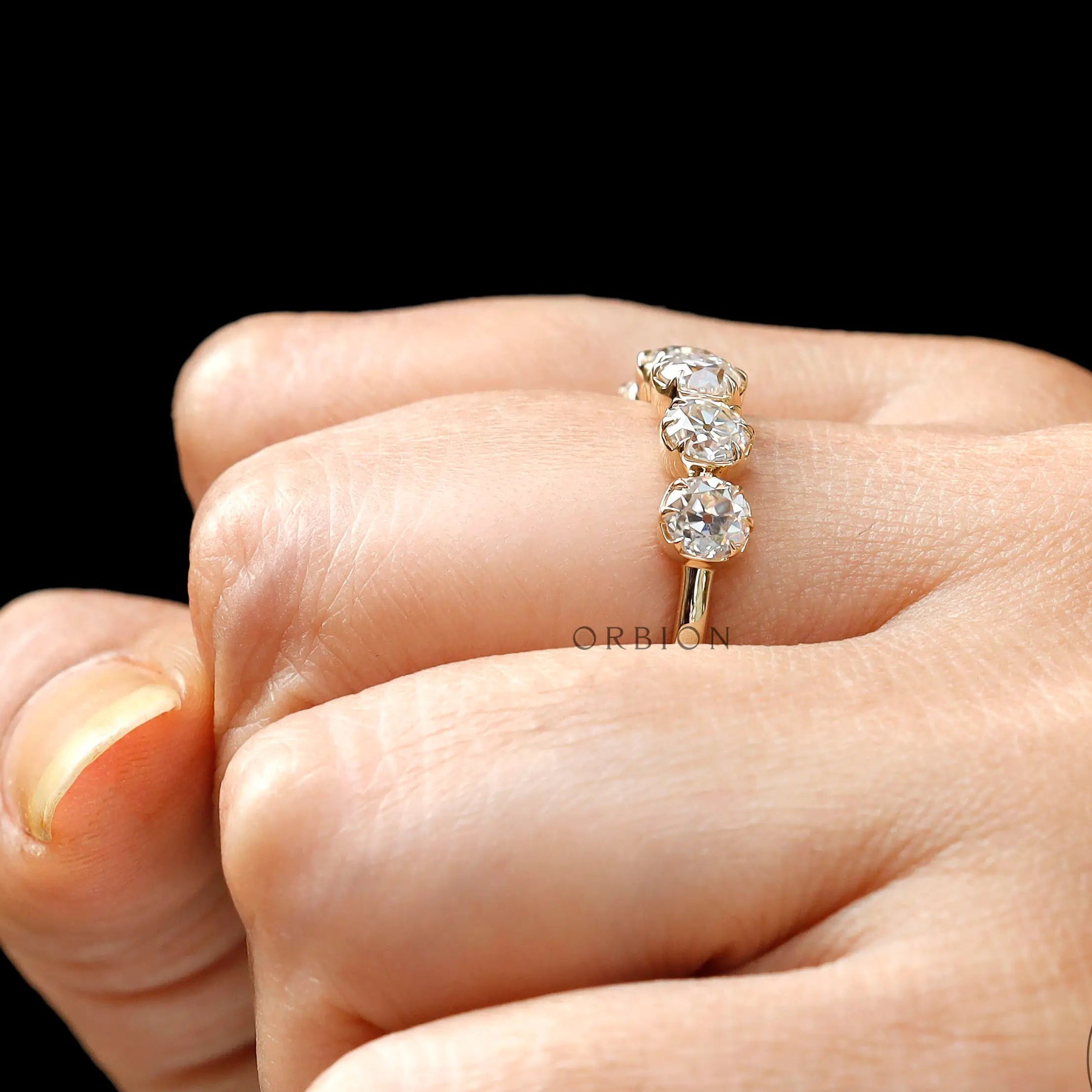 Close up of round old european cut moissanite