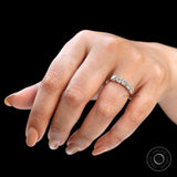 Side hand pose highlighting elongated cushion moissanite band