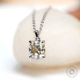 Elongated cushion Old Mine cut moissanite pendant in white gold close-up
