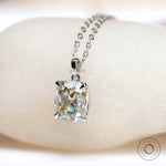 Cushion cut solitaire pendant with four prong setting on chain