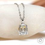 Back view of pendant showing secure setting and metal finish