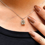 Moissanite pendant necklace worn on neck with natural styling