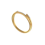Angled three-quarter view delicate yellow gold pave stacking band.
