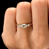 Close up of milgrain bezel cushion moissanite ring