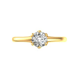Top view round solitaire ring in yellow gold with petal prongs.