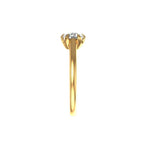 Straight side profile view low-set round solitaire with tapered yellow gold band.