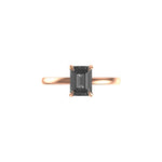 Front view of emerald cut grey moissanite solitaire ring in rose gold.