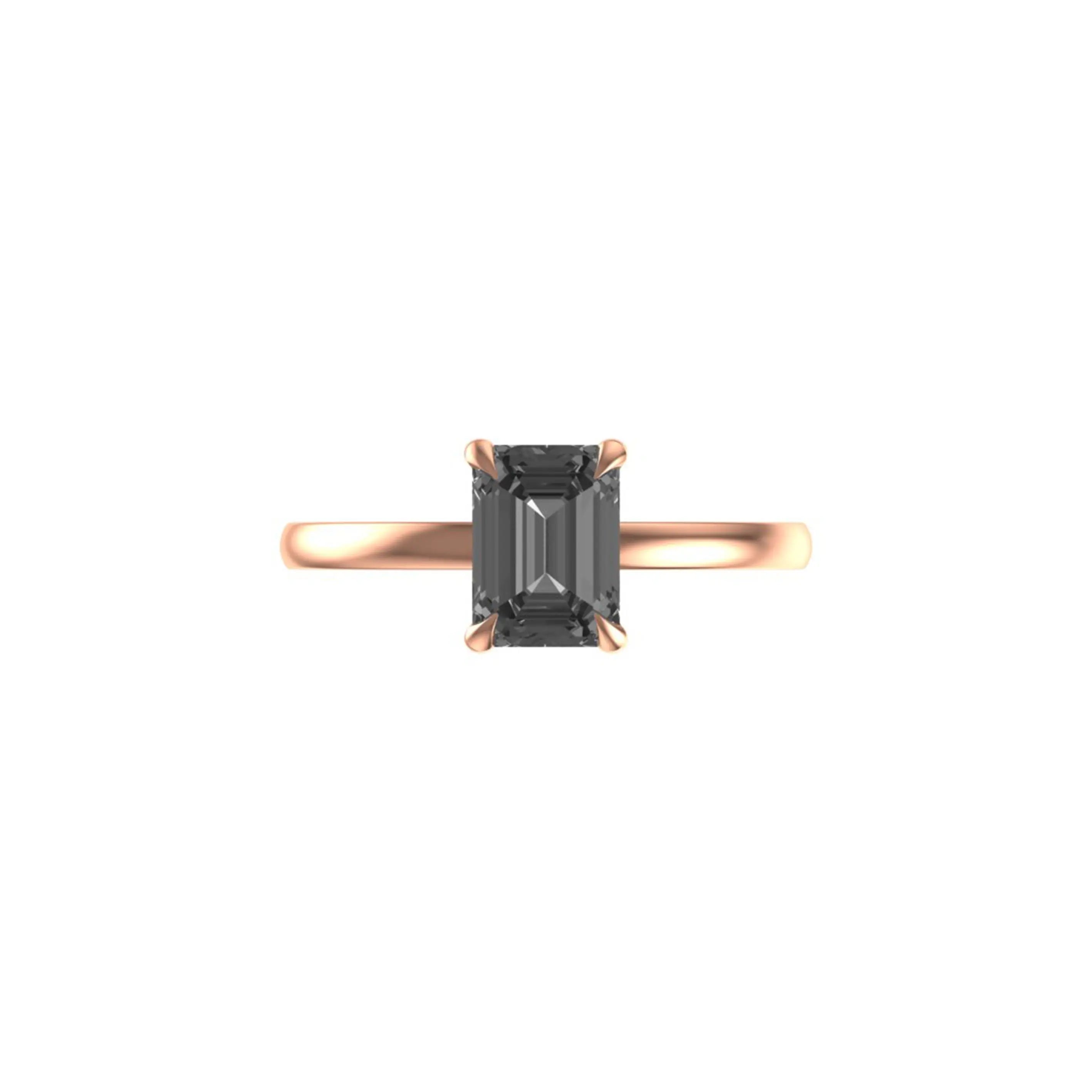 Front view of emerald cut grey moissanite solitaire ring in rose gold.