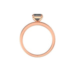 Profile back view of minimalist rose gold band with elevated basket setting.