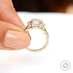 Side profile view of elevated basket setting held between fingers