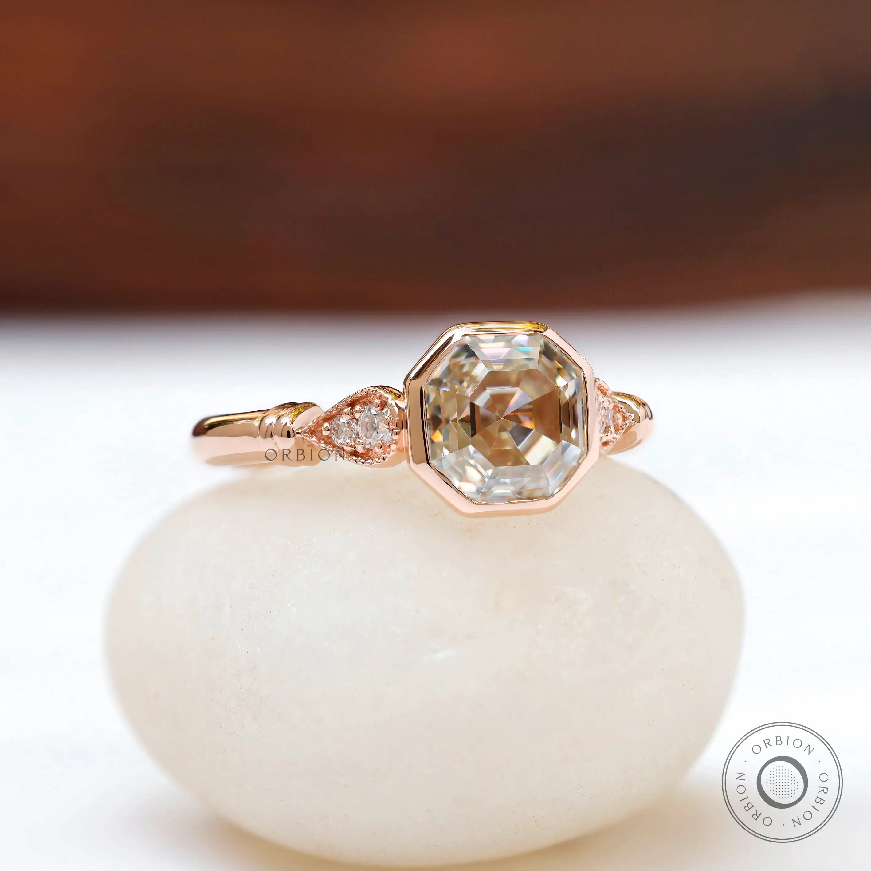 Angled view showcasing cathedral design of Octavia ring with side diamonds