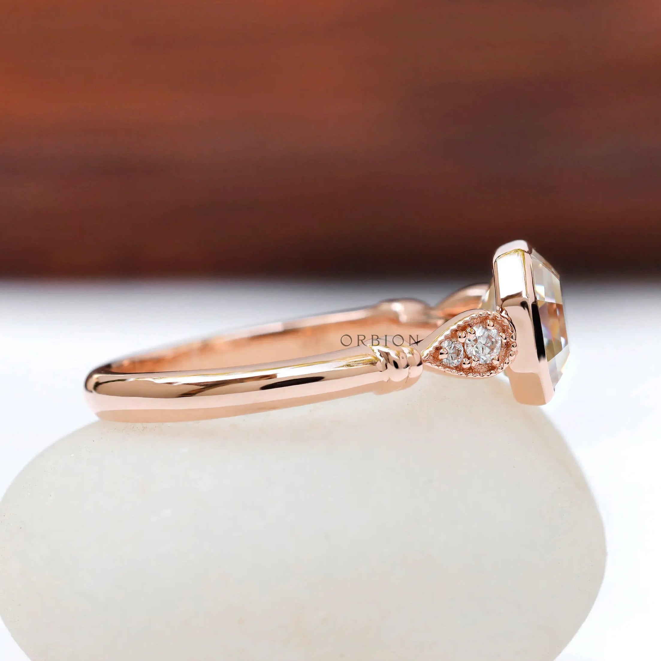 Side view showcasing cathedral design of Octavia ring with side diamonds
