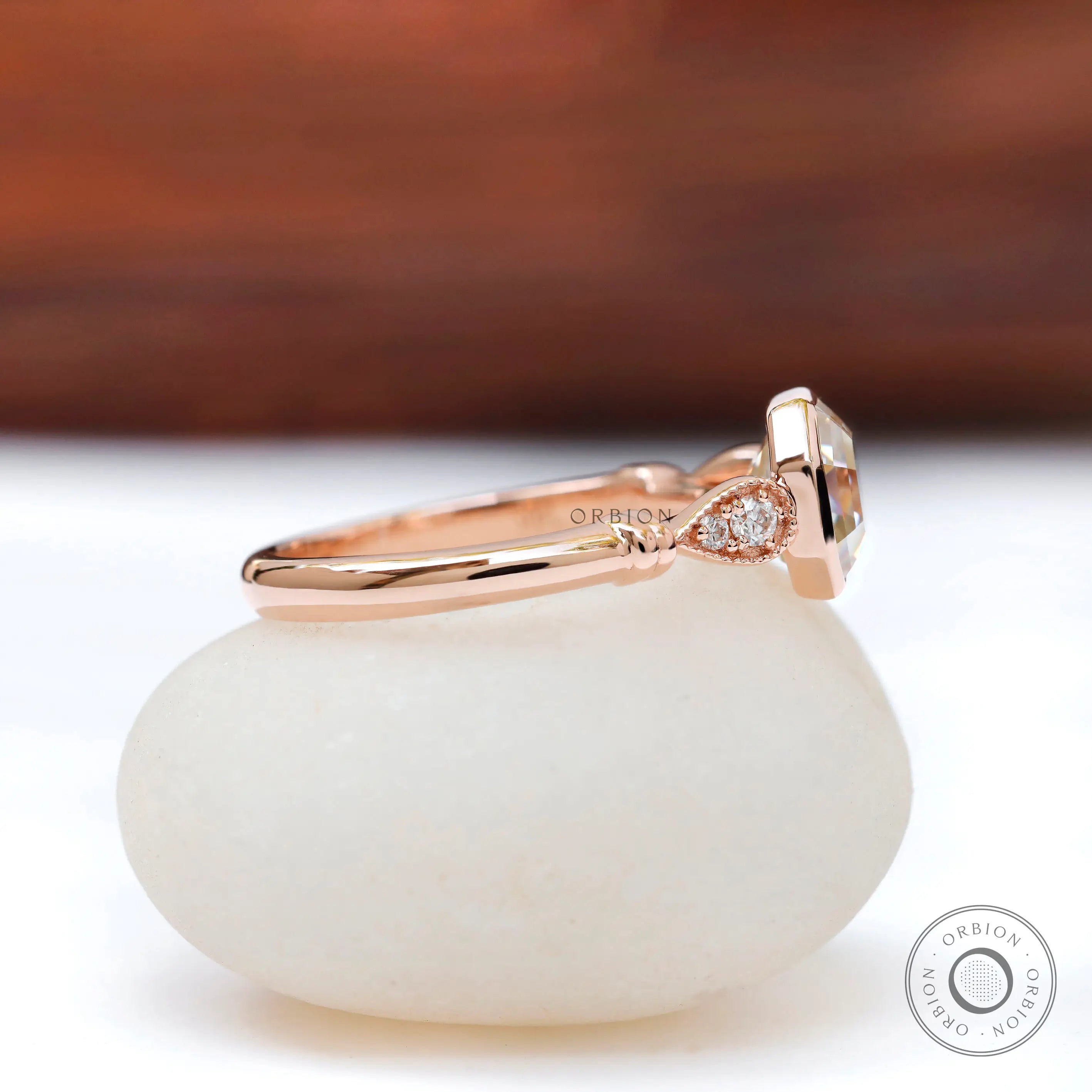 Side view showcasing cathedral design of Octavia ring with side diamonds