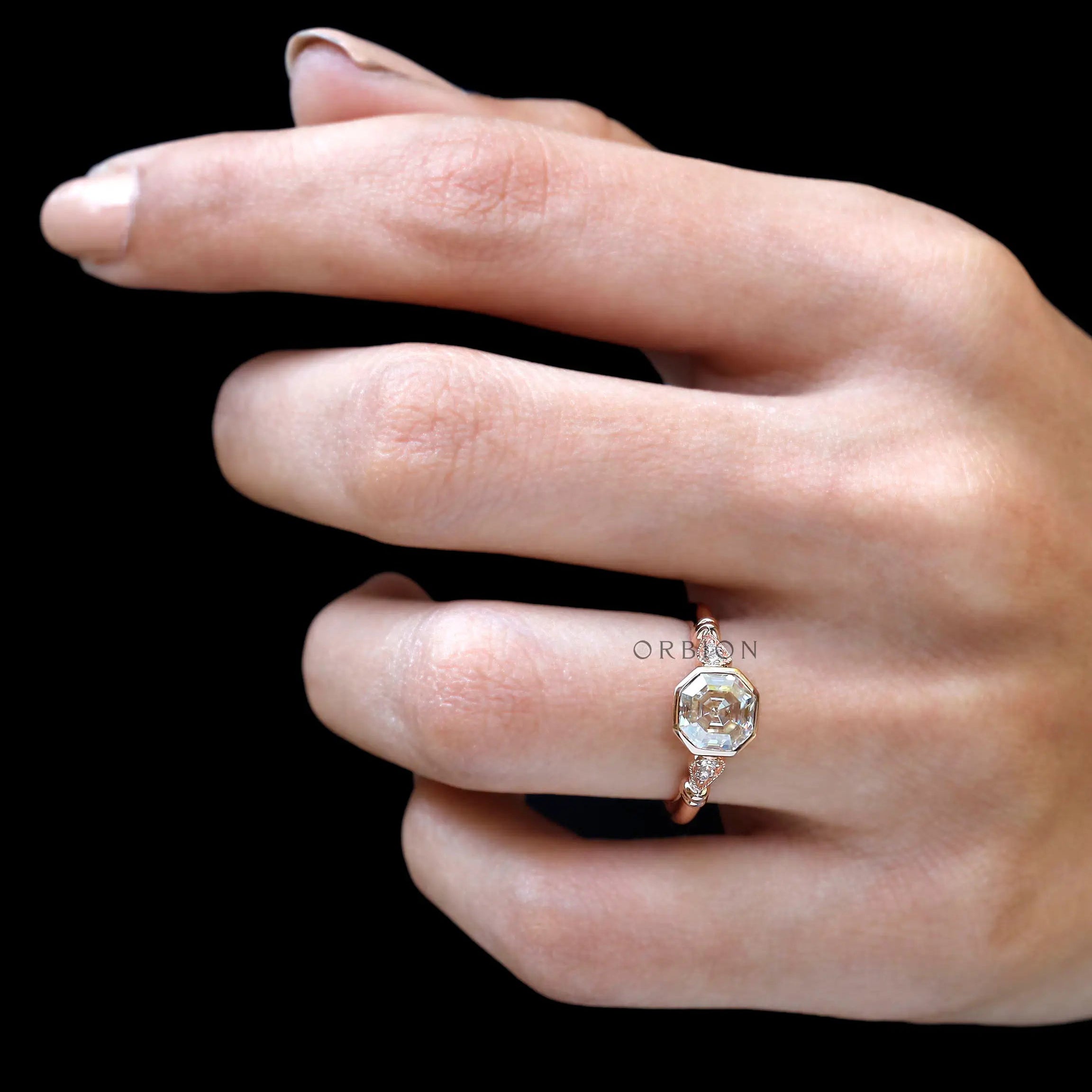 Model wearing Octavia Asscher Cut Moissanite Engagement Ring