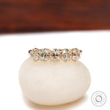 Front view of five stone old mine cut cushion moissanite band