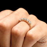 On-hand top view of five stone old mine cut cushion moissanite ring