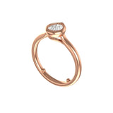 Angled view highlighting cathedral shoulders and pear bezel setting.