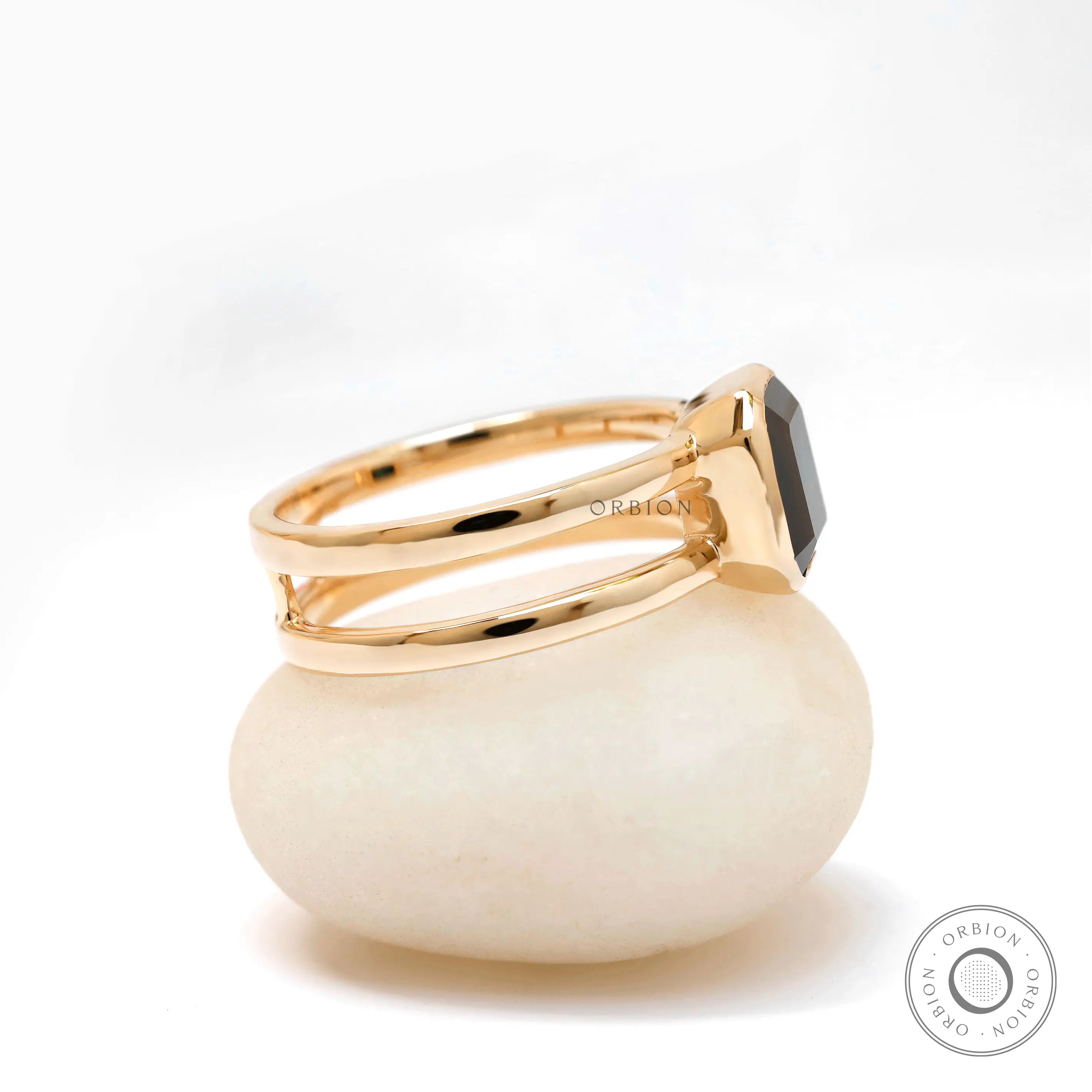Side view of Moissanite Solitaire Elongated Asscher ring in 14K yellow gold