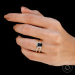 Elongated Asscher Moissanite ring with black green stone from side view