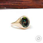 Front view of oval old mine cut moissanite signet ring