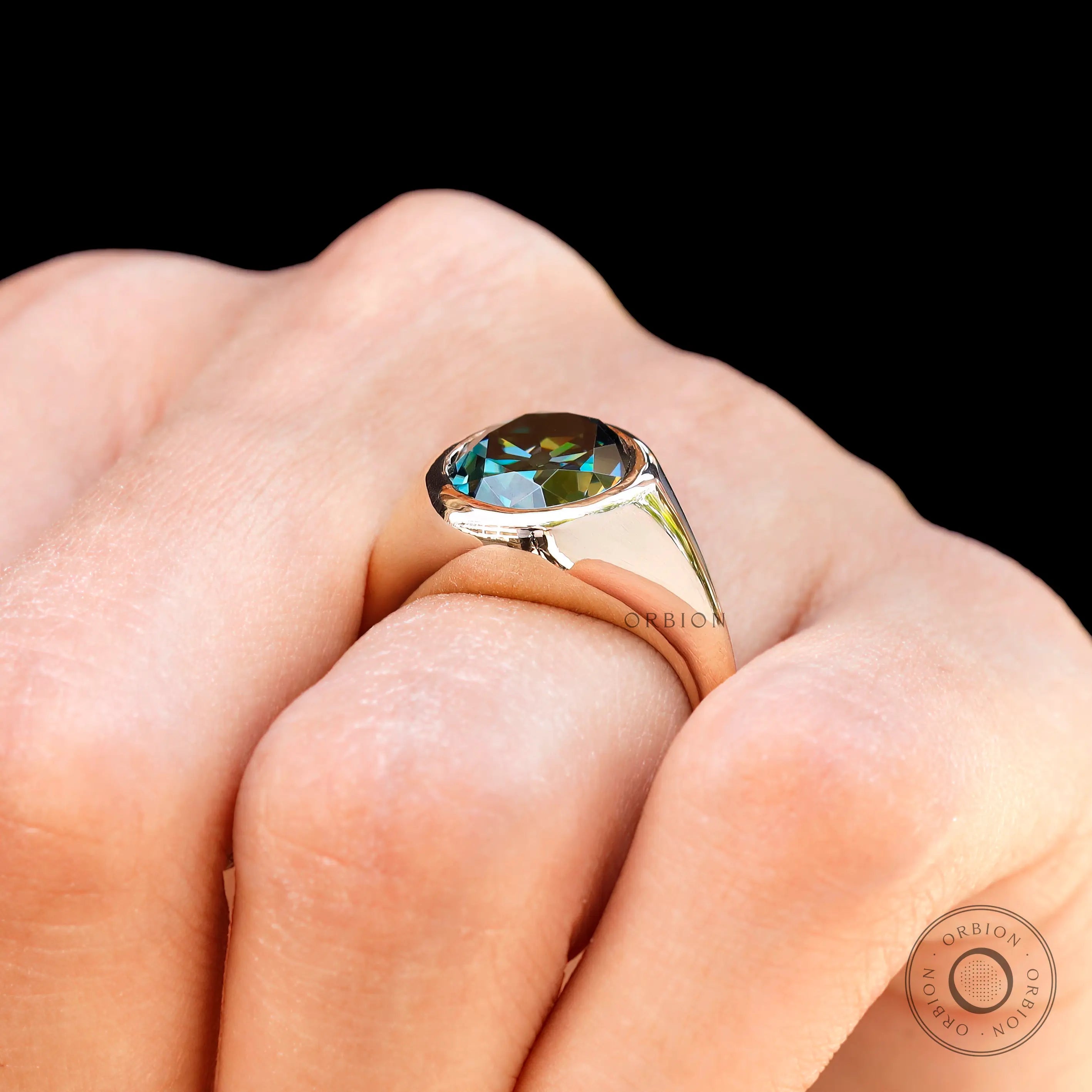 High polish yellow gold signet ring with oval moissanite