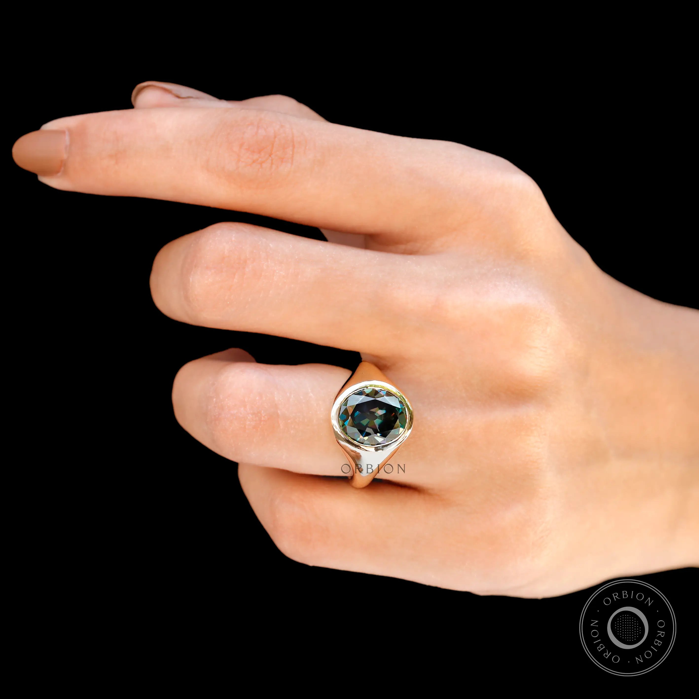 Minimalist oval moissanite signet ring top view
