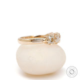 Side profile of vintage five stone moissanite band with solid gold shank