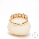 Interior view of five stone moissanite wedding band highlighting gallery details